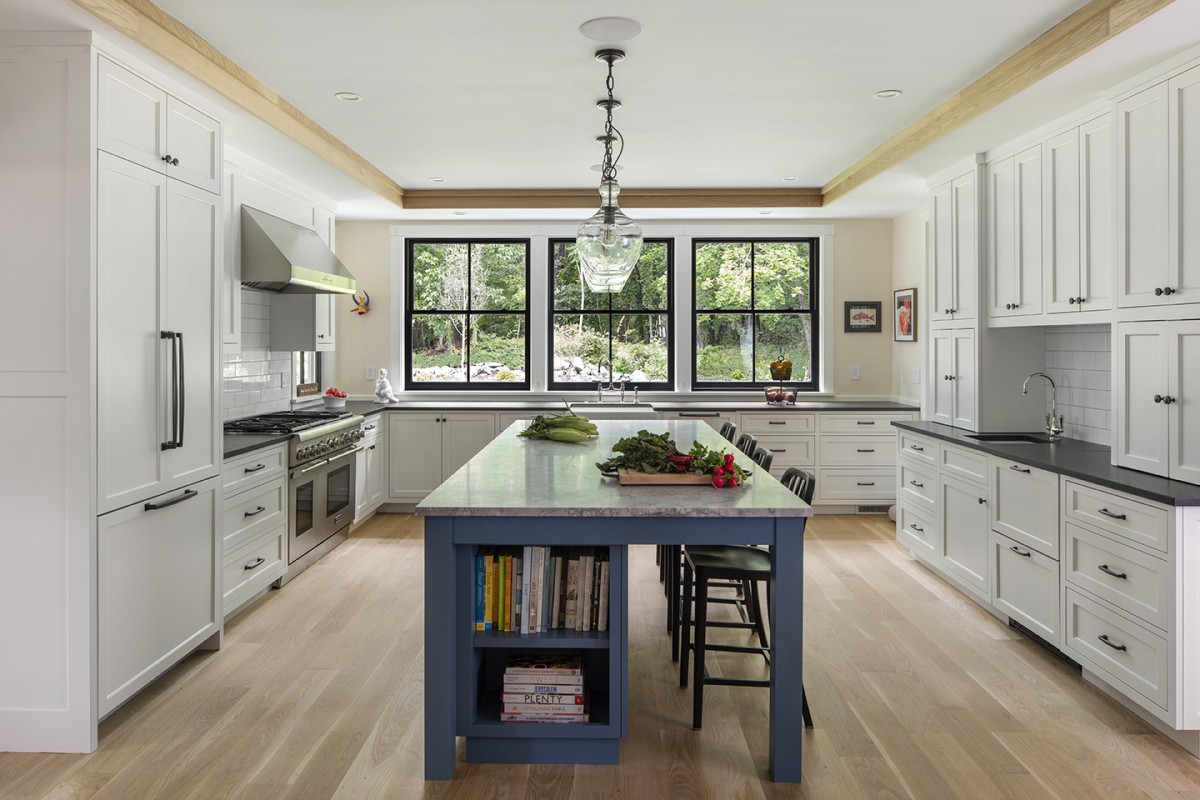 transitional kitchen with large island© Jacob Lilley Architects Needham, MA