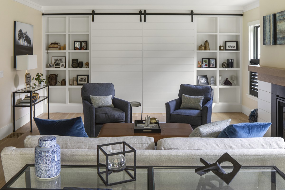 living room with barn doors© Jacob Lilley Architects Needham, MA