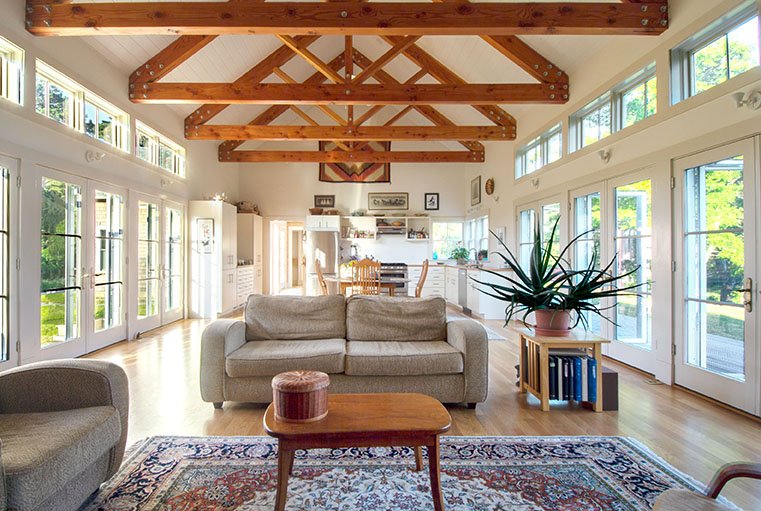 douglas fir wood king post truss in living room© Jacob Lilley Architects Orleans, MA