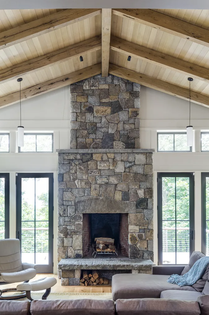 granite wood burning fireplace with granite bench