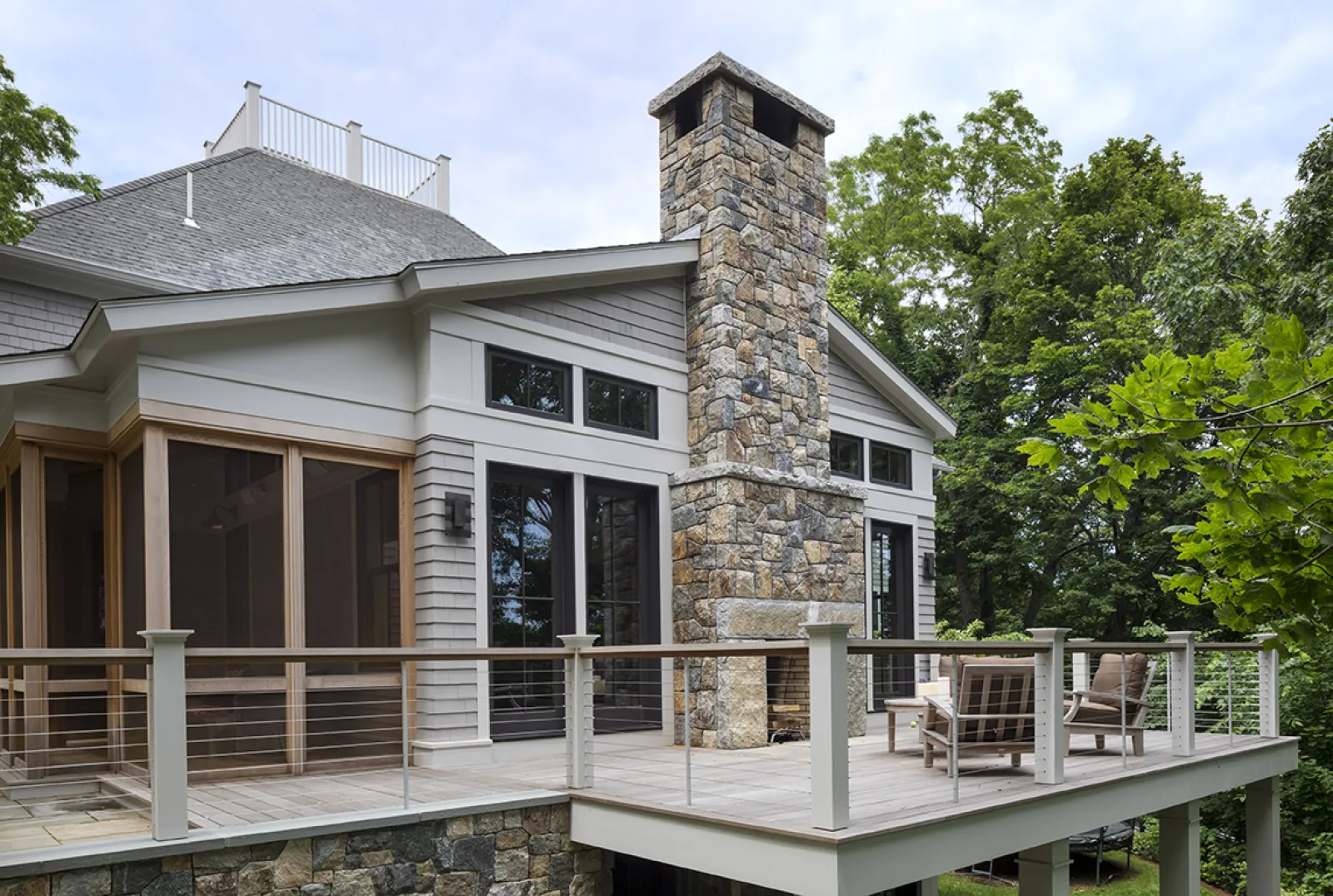 exterior addition with oublesied granite fireplace