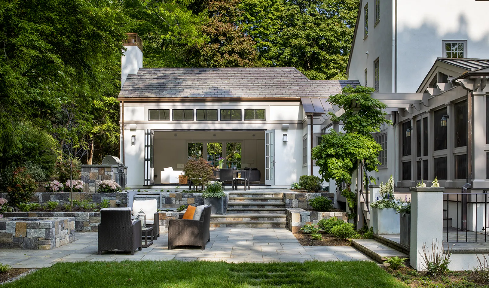 outdoor view of house with stone patio