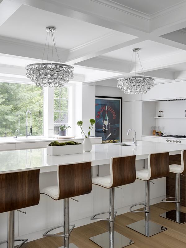 transitional kitchen with large island and pendants