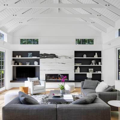 family room with cathedral ceiling and wood beams